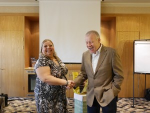 Fred and Lee shaking hands